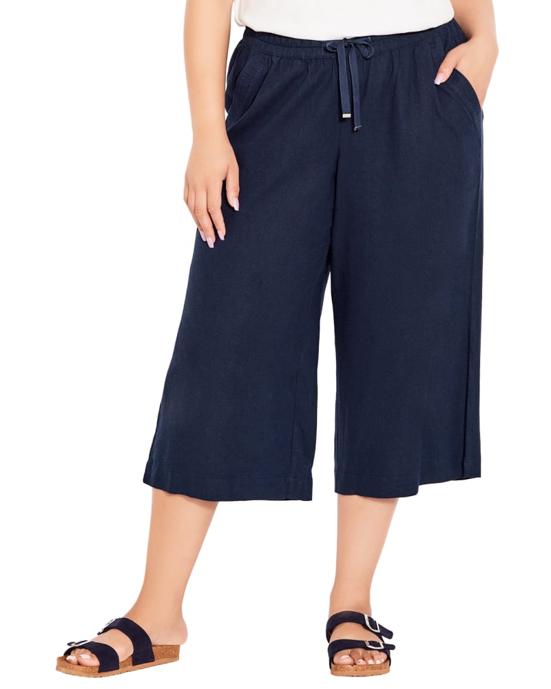 Front of a model wearing a size 22 WIDE LEG CROP PANT in Navy by avenue. | dia_product_style_image_id:293445